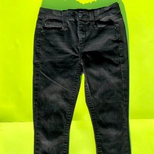 black mid-rise skinny jeans